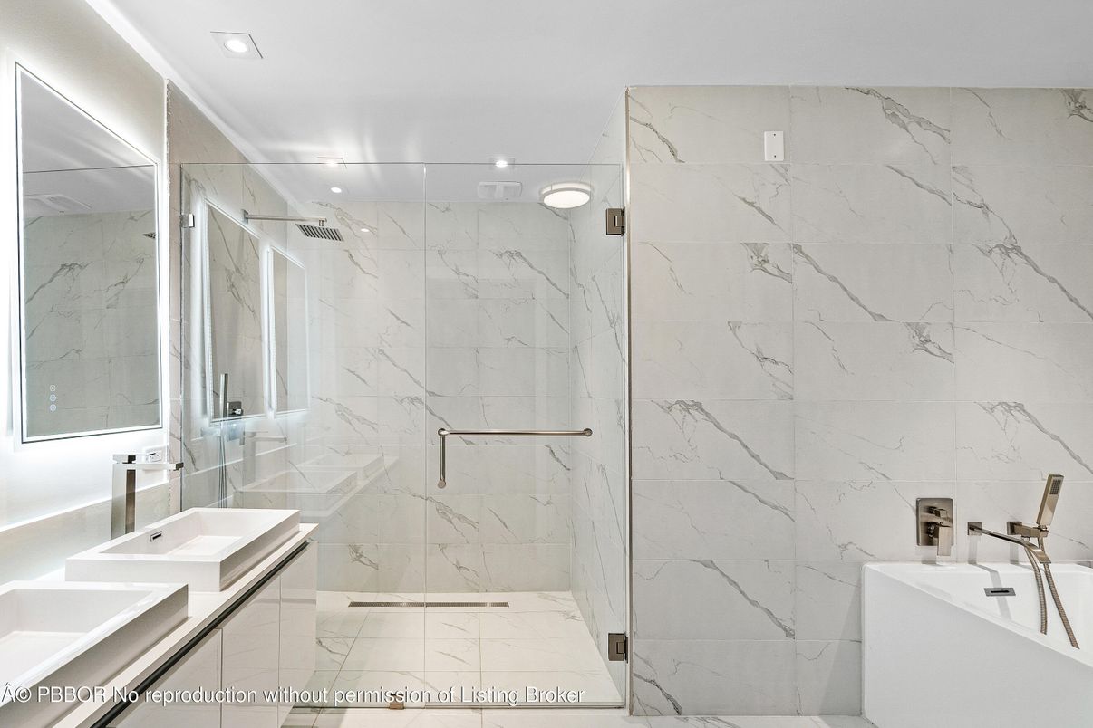 Bathroom, Dual Sink Vanities, Glass Shower, Interior, Marble, Marble Walls, Recessed Lighting