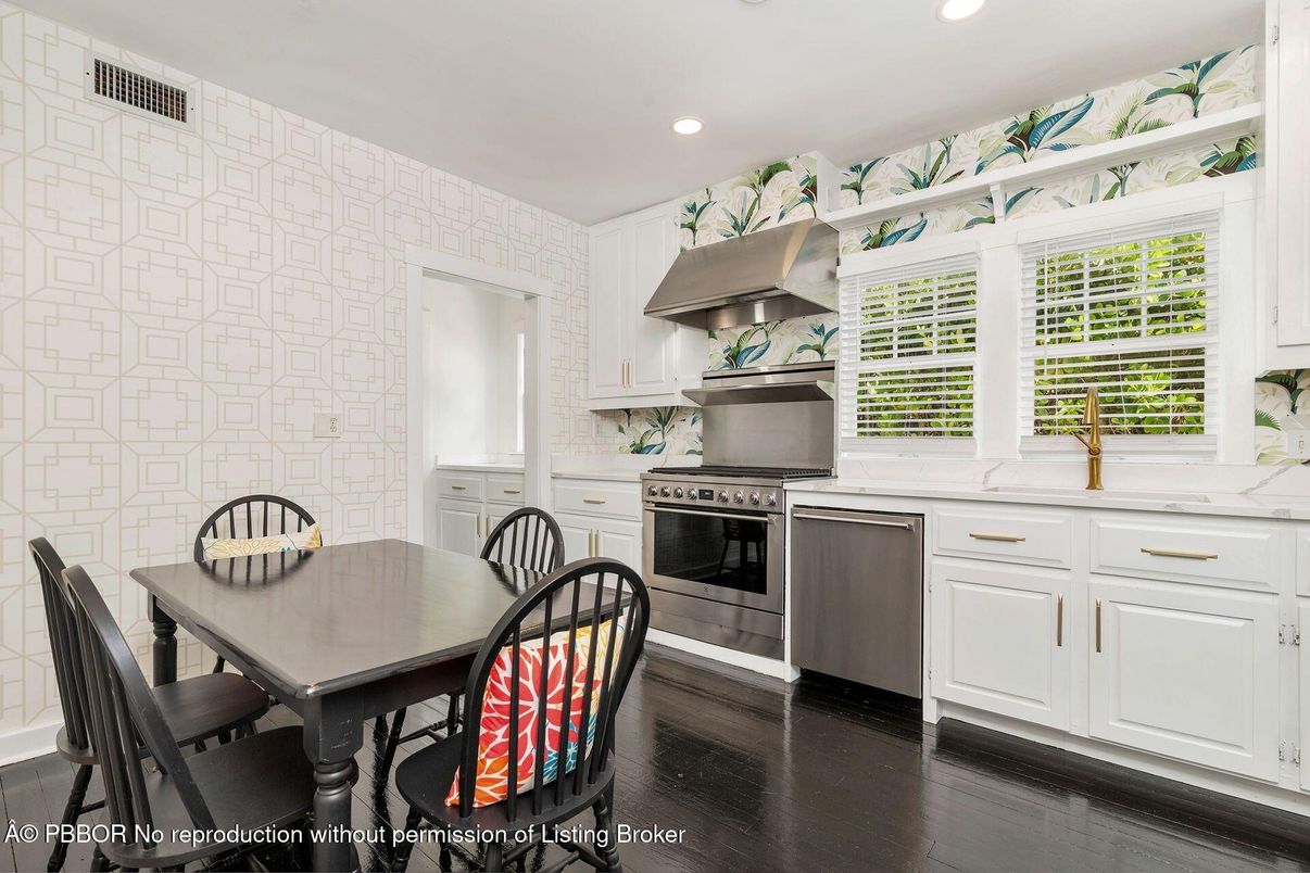 Dining room, Interior, Kitchen, Recessed Lighting, Stainless Steel Appliances, Stone Walls, Wood Texture Flooring