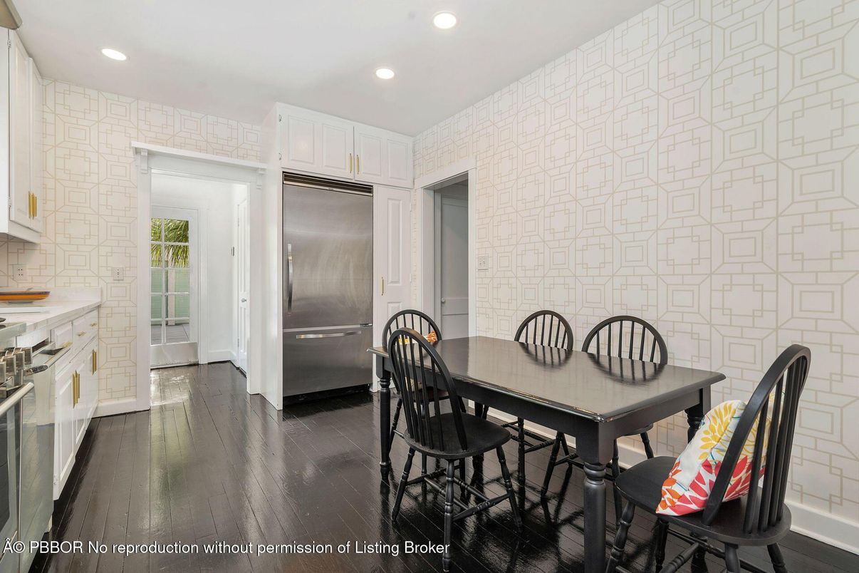 Dining room, Interior, Kitchen, Recessed Lighting, Stainless Steel Appliances, Stone Walls, Wood Texture Flooring