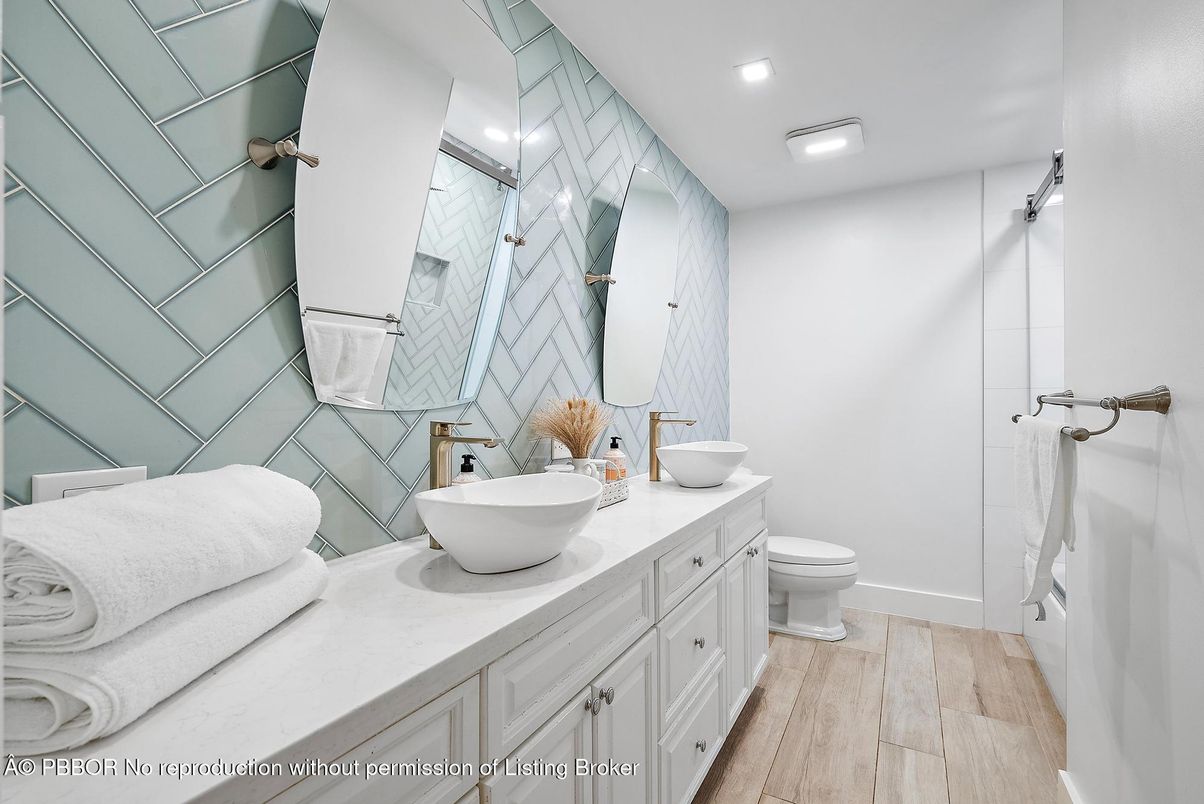 Bathroom, Dual Sink Vanities, Glass Shower, Interior, Recessed Lighting, Wood Texture Flooring