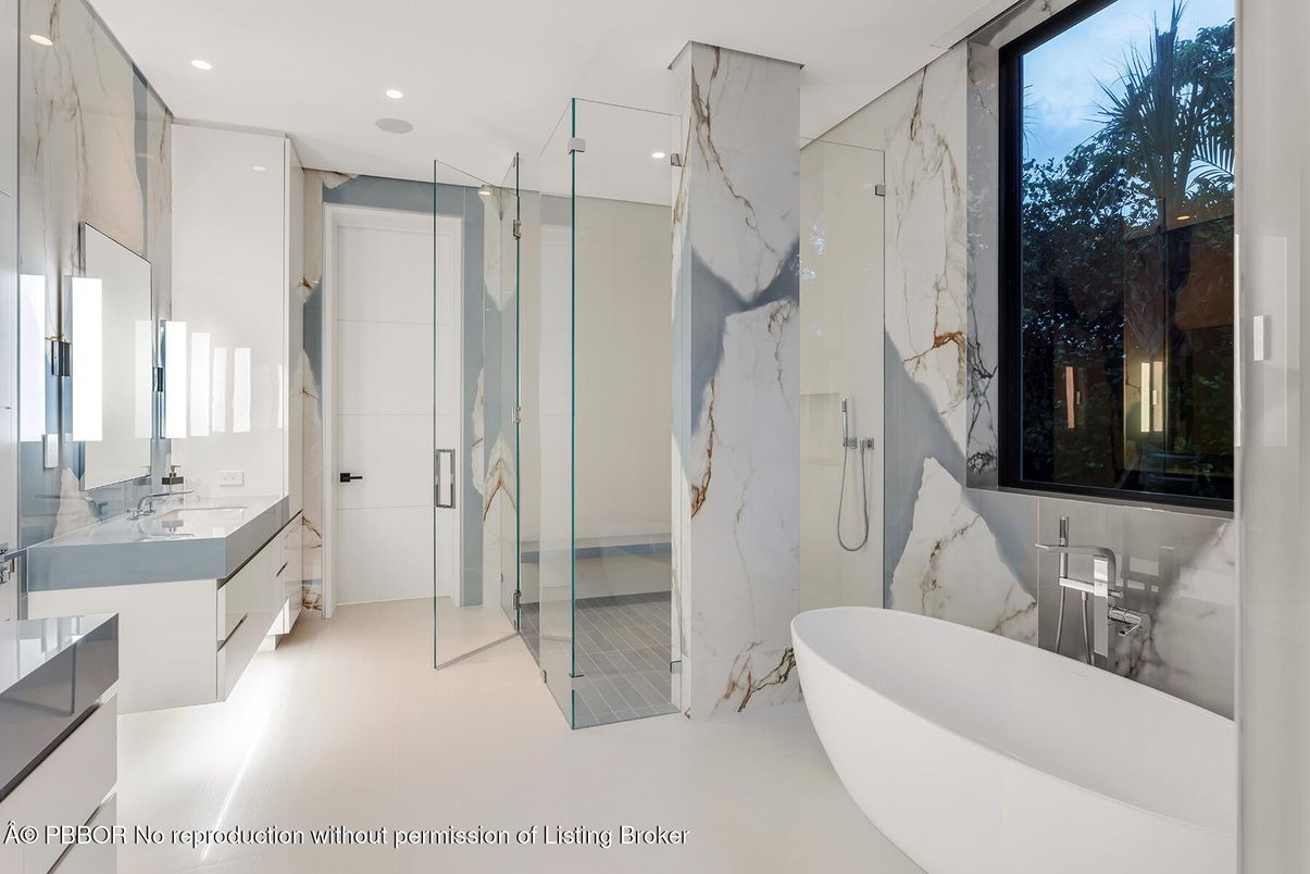 Bathroom, Dual Sink Vanities, Free Standing Baths, Glass Shower, Interior, Marble Walls, Recessed Lighting