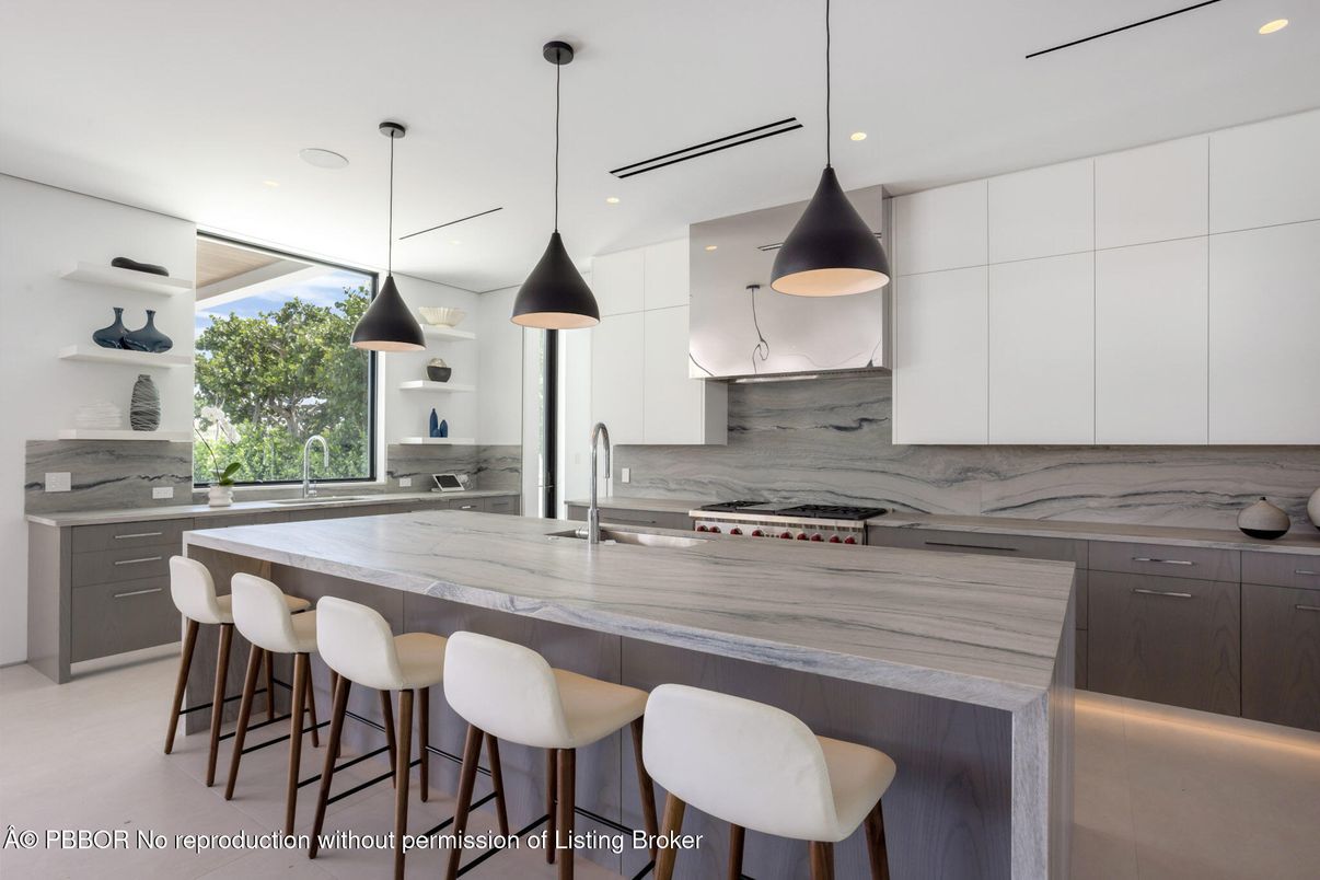 Interior, Kitchen, Marble Walls, Pendant Lights, Recessed Lighting, Stainless Steel Appliances
