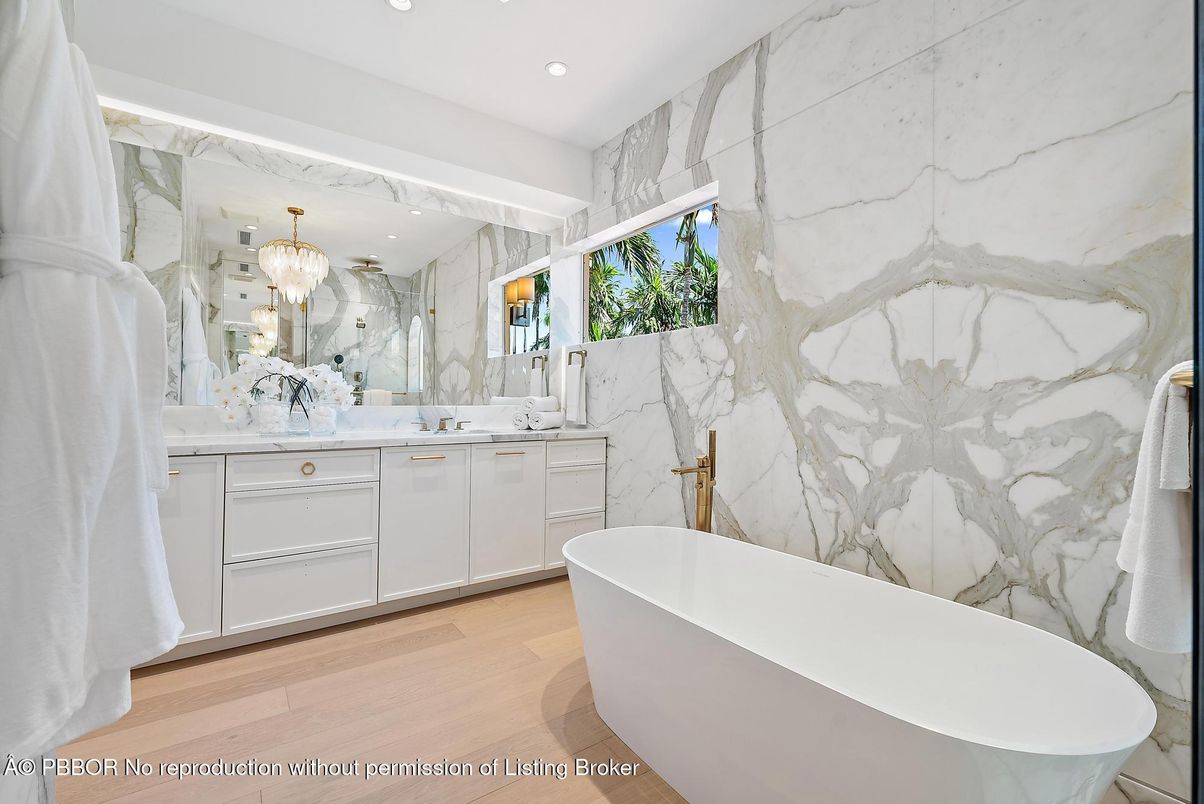 Bathroom, Dual Sink Vanities, Free Standing Baths, Interior, Marble Walls, Recessed Lighting, Wood Texture Flooring