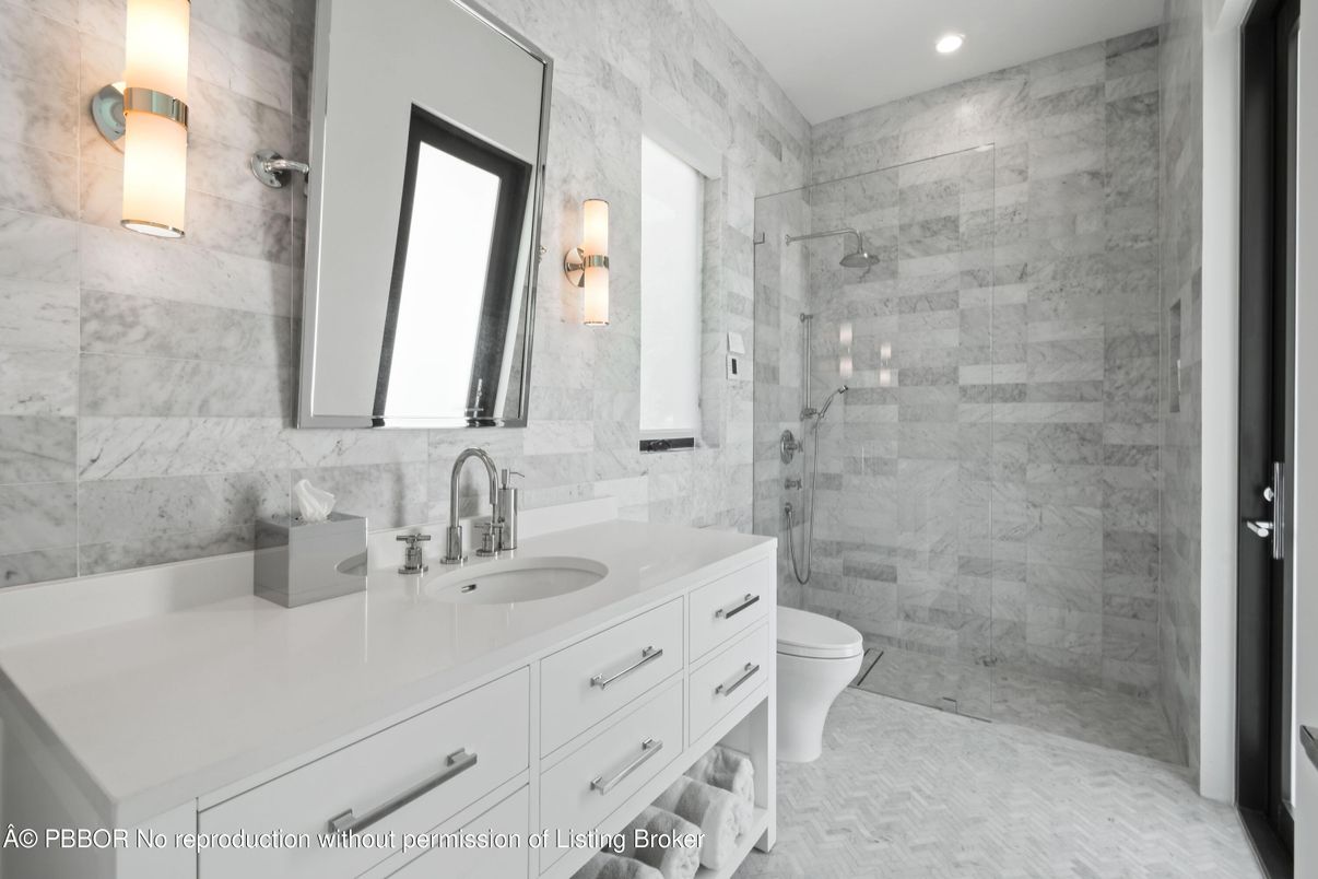 Bathroom, Dual Sink Vanities, Glass Shower, Interior, Marble Walls, Recessed Lighting