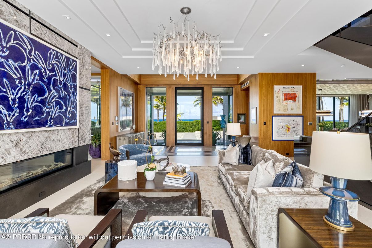 Chandelier, Fireplace, Interior, Living room, Recessed Lighting, Water, Wooden Walls