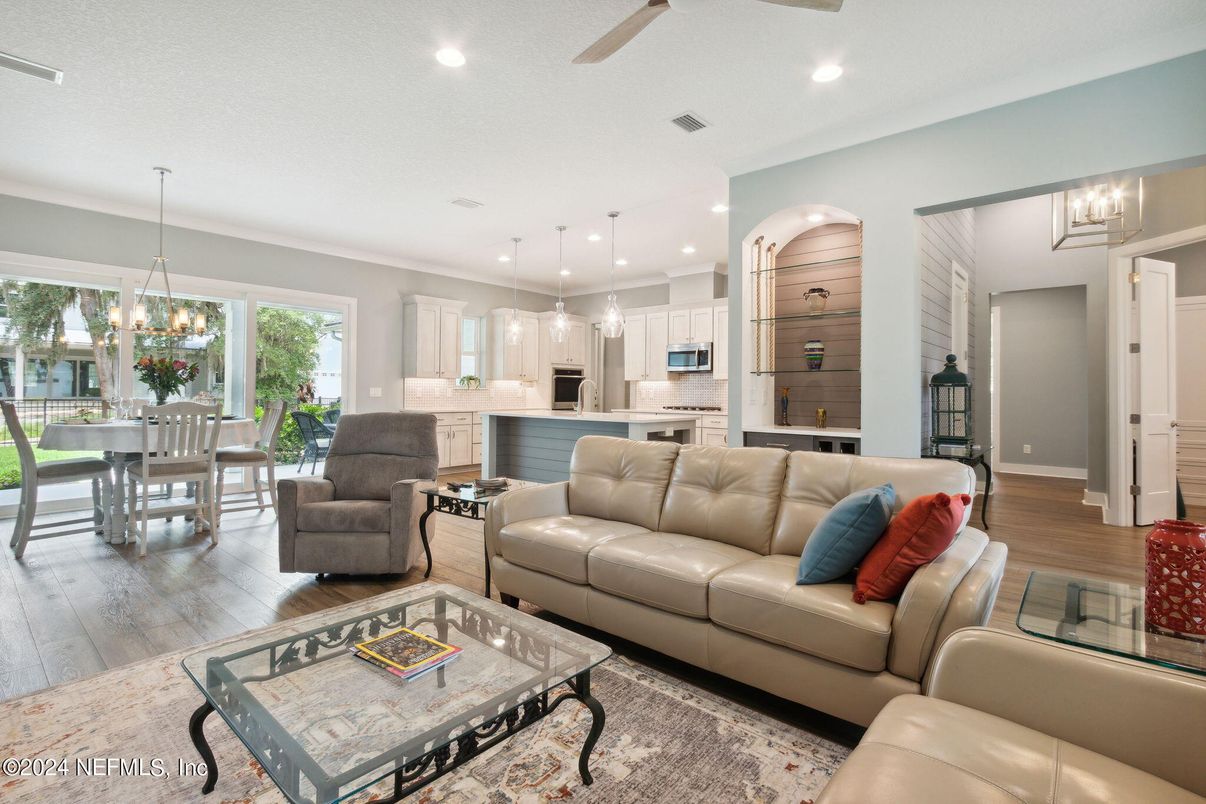 Dining room, Interior, Kitchen, Living room, Pendant Lights, Recessed Lighting, Stainless Steel Appliances, Wood Texture Flooring