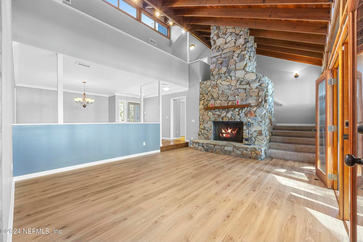 Chandelier, Fireplace, Interior, Stone Walls, Wooden Beams, Wood Texture Flooring