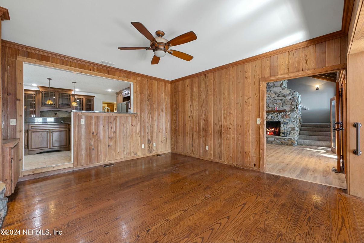 Empty room, Fireplace, Interior, Kitchen, Pendant Lights, Stone Walls, Wood Texture Flooring, Wooden Walls