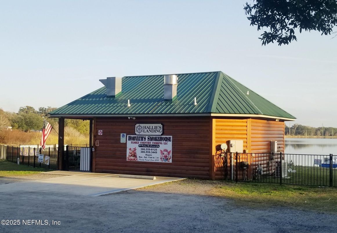 Exterior, Facade, Water, Log Home