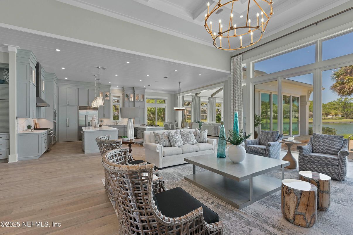 Chandelier, Dining room, Interior, Kitchen, Living room, Pendant Lights, Recessed Lighting, Water, Wood Texture Flooring