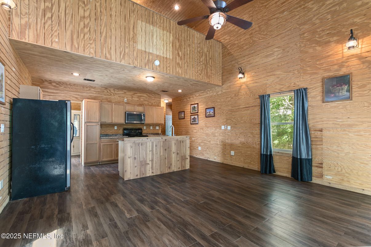 Interior, Kitchen, Recessed Lighting, Stainless Steel Appliances, Wood Texture Flooring, Wooden Walls