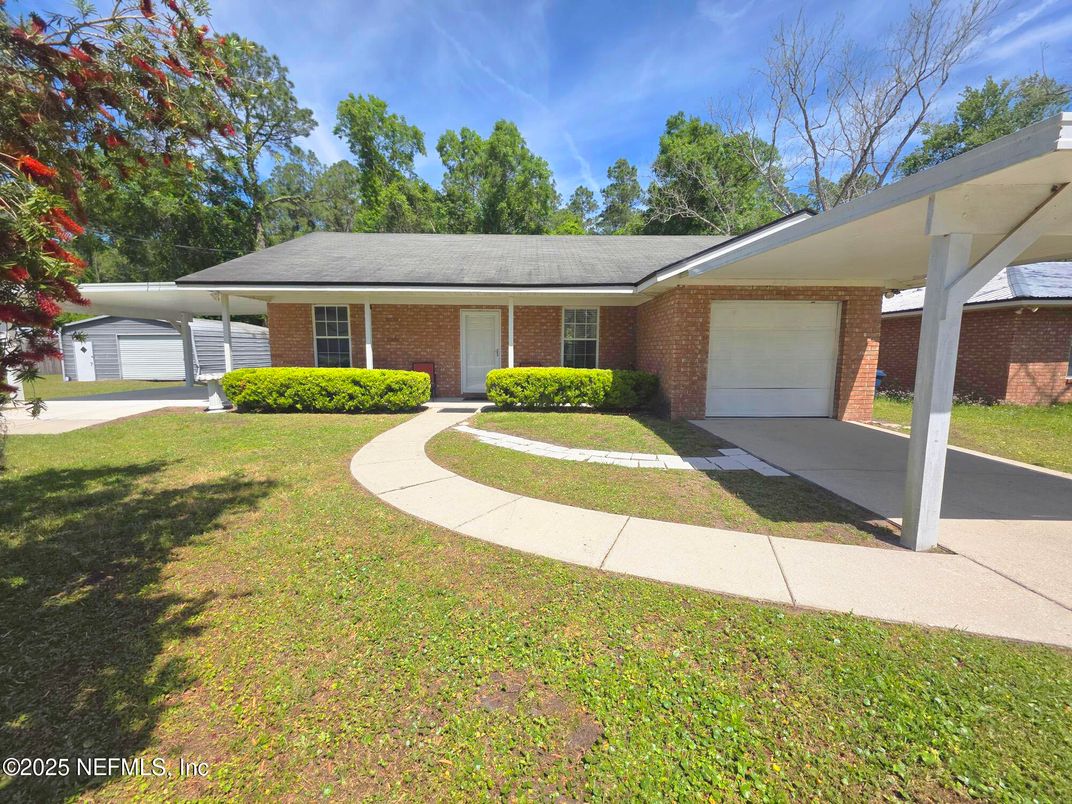 Attached, Backyard, Exterior, Facade, Brick Facade, Ranch