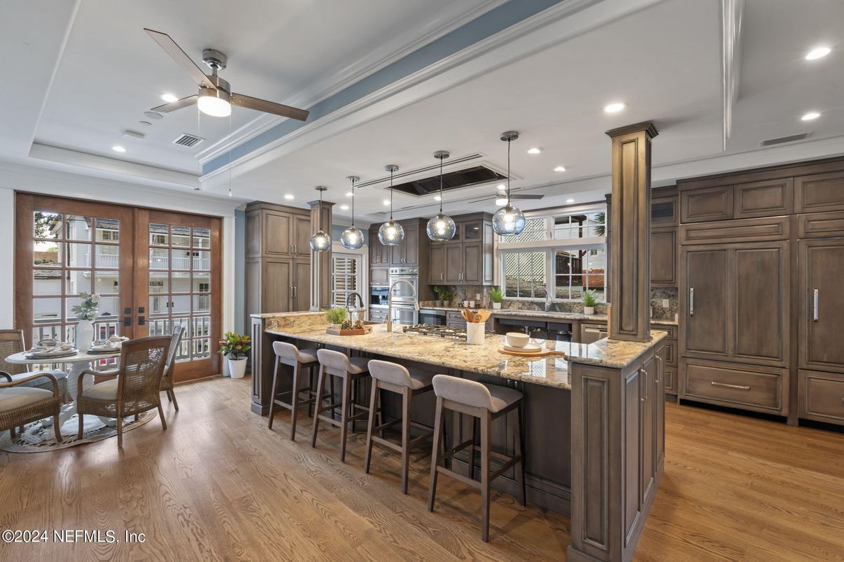 Dining room, Interior, Kitchen, Pendant Lights, Recessed Lighting, Stainless Steel Appliances, Wood Texture Flooring