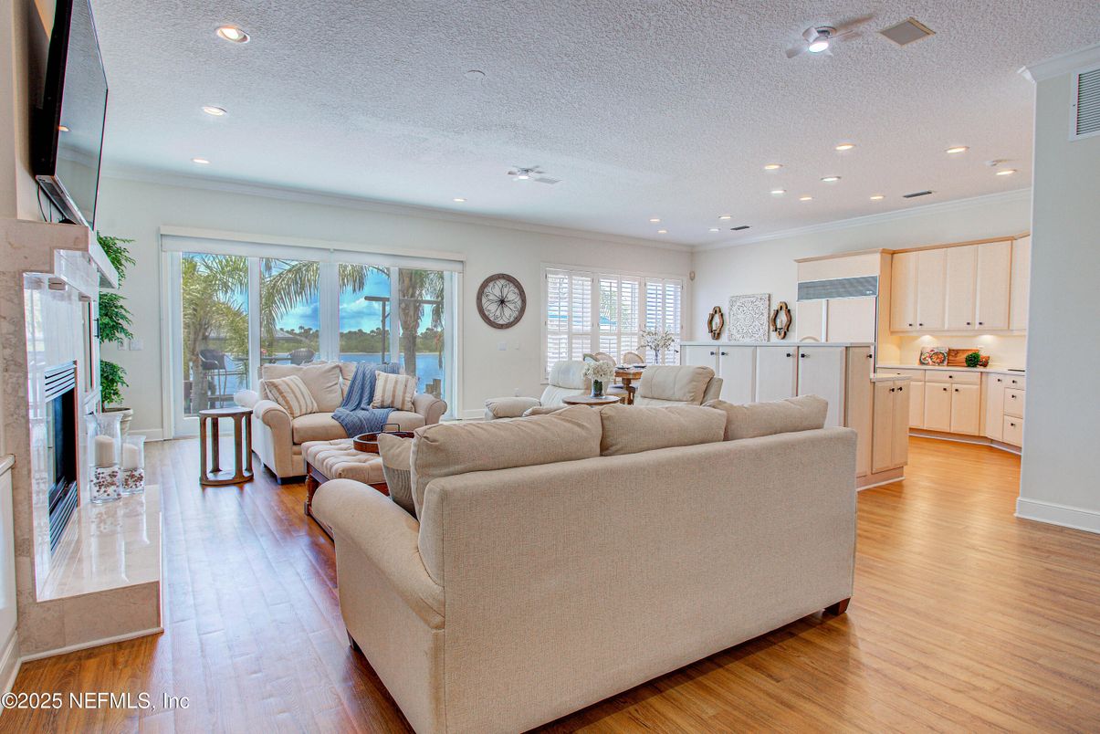 Fireplace, Interior, Living room, Recessed Lighting, Wood Texture Flooring