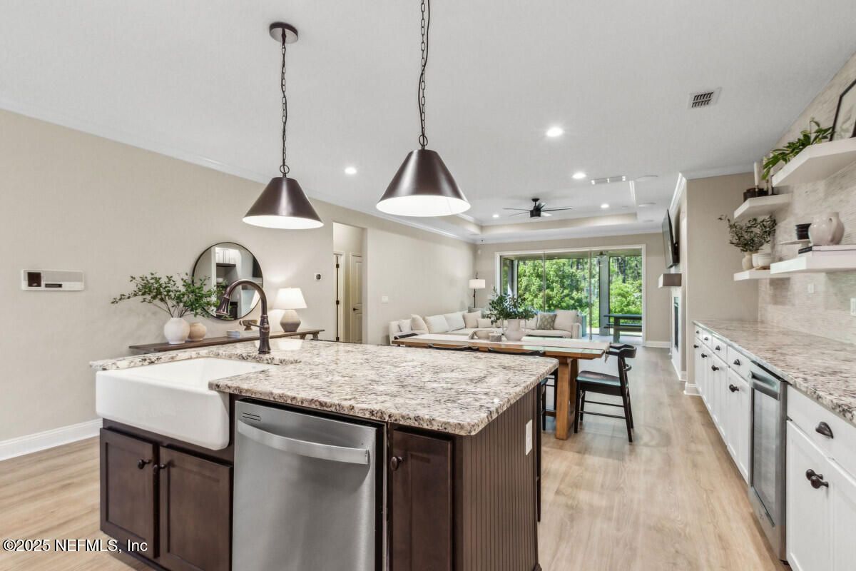 Dining room, Interior, Kitchen, Pendant Lights, Recessed Lighting, Stainless Steel Appliances, Wood Texture Flooring