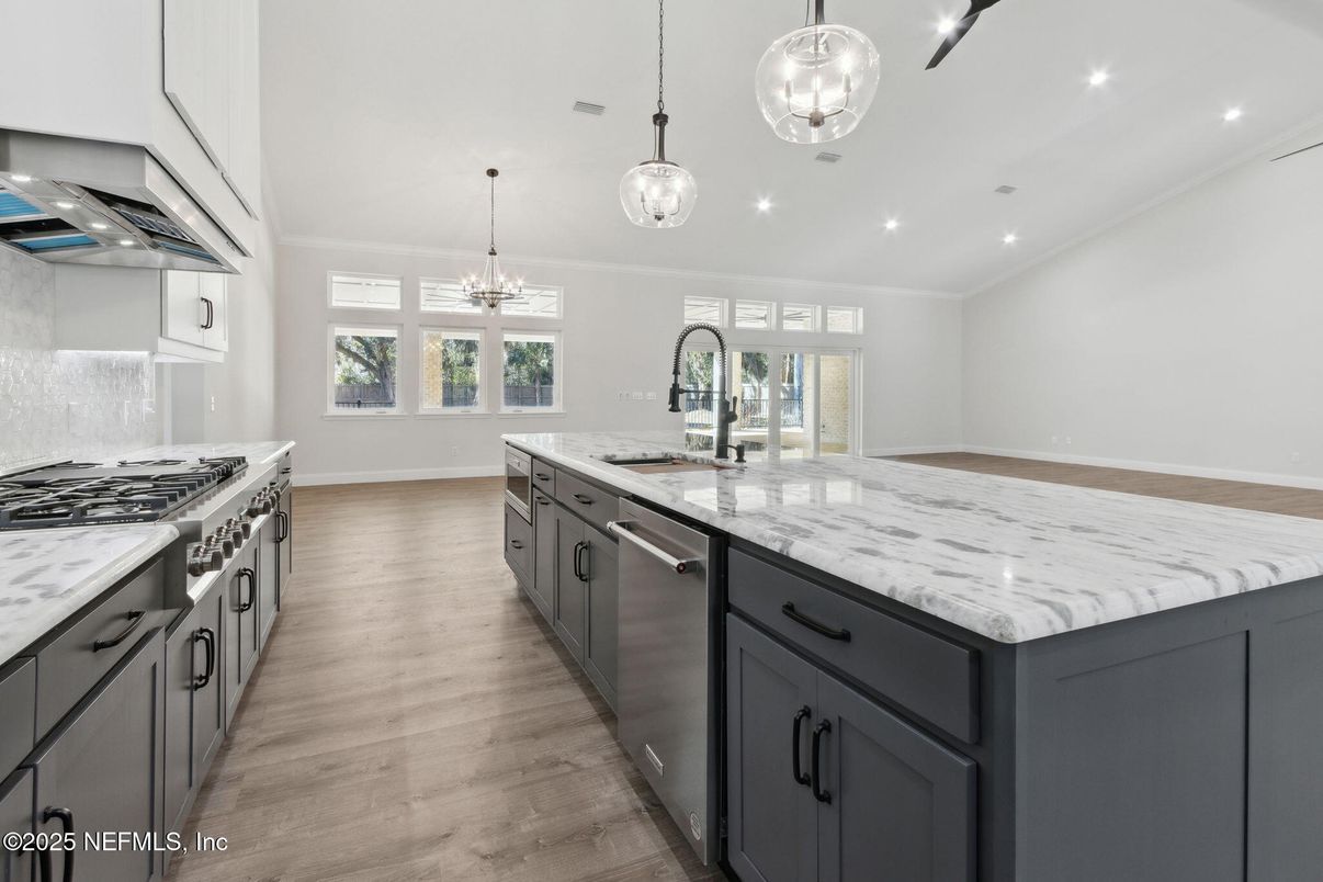 Chandelier, Interior, Kitchen, Pendant Lights, Recessed Lighting, Stainless Steel Appliances, Wood Texture Flooring