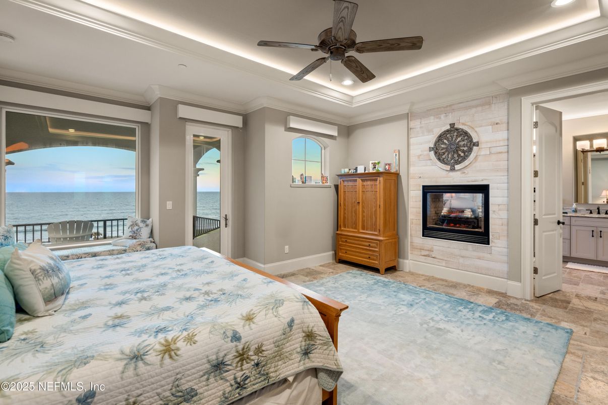 Bedroom, Fireplace, Interior, Recessed Lighting, Stone Walls, Water