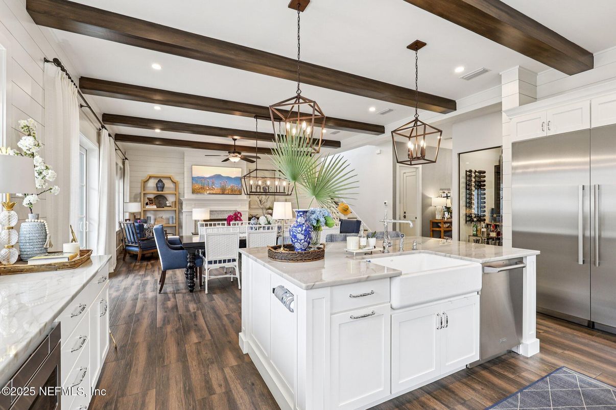 Dining room, Interior, Kitchen, Living room, Pendant Lights, Recessed Lighting, Stainless Steel Appliances, Wooden Beams, Wood Texture Flooring