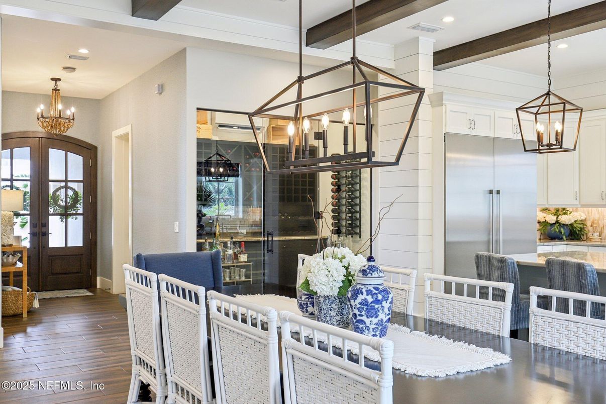 Chandelier, Dining room, Interior, Kitchen, Pendant Lights, Recessed Lighting, Stainless Steel Appliances, Wooden Beams, Wood Texture Flooring