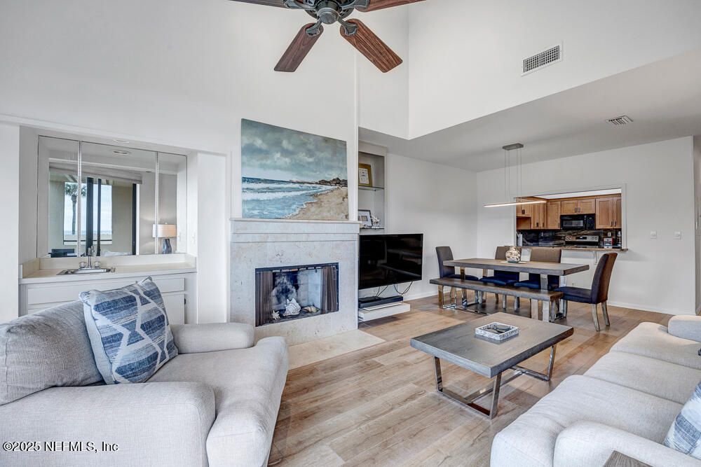 Dining room, Fireplace, Interior, Kitchen, Living room, Pendant Lights, Wood Texture Flooring