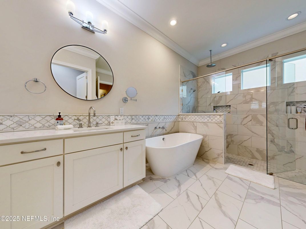 Bathroom, Dual Sink Vanities, Free Standing Baths, Glass Shower, Interior, Marble, Marble Walls, Recessed Lighting