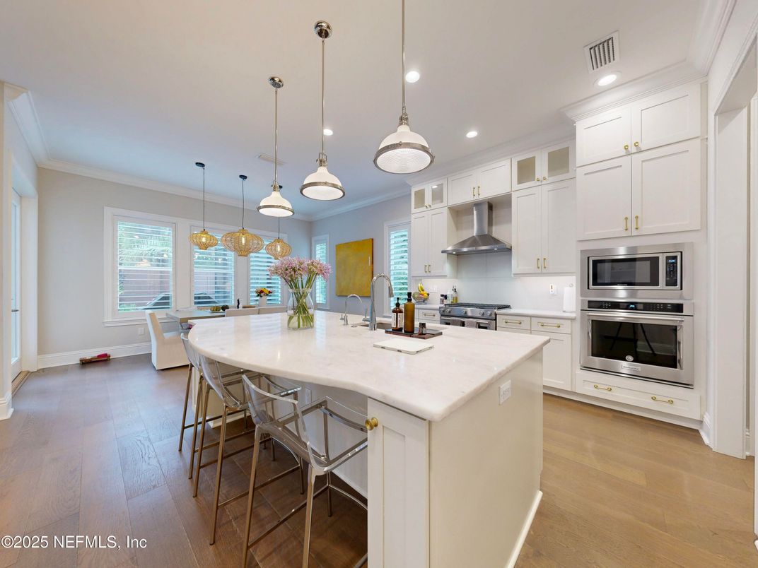 Dining room, Interior, Kitchen, Pendant Lights, Recessed Lighting, Stainless Steel Appliances, Wood Texture Flooring