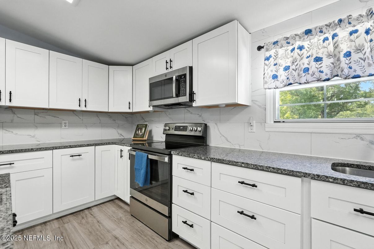Interior, Kitchen, Marble Walls, Stainless Steel Appliances, Wood Texture Flooring