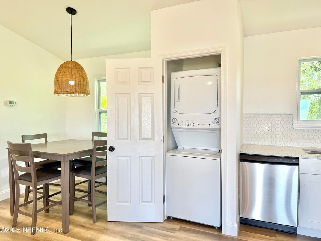 Dining room, Interior, Pendant Lights, Utility Closets, Washer, Wood Texture Flooring