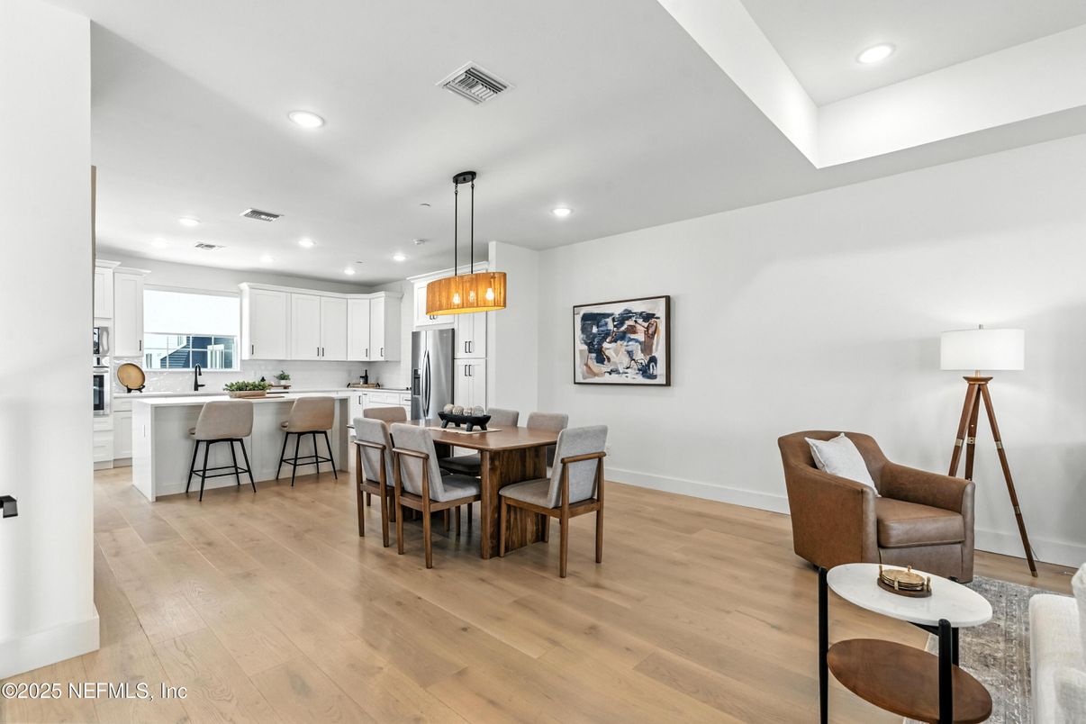 Dining room, Interior, Kitchen, Pendant Lights, Recessed Lighting, Stainless Steel Appliances, Wood Texture Flooring