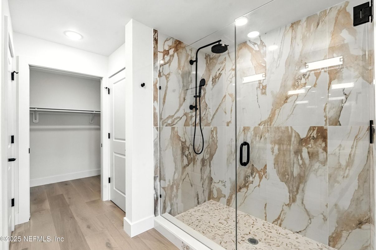Bathroom, Glass Shower, Interior, Marble Walls, Recessed Lighting, Wood Texture Flooring