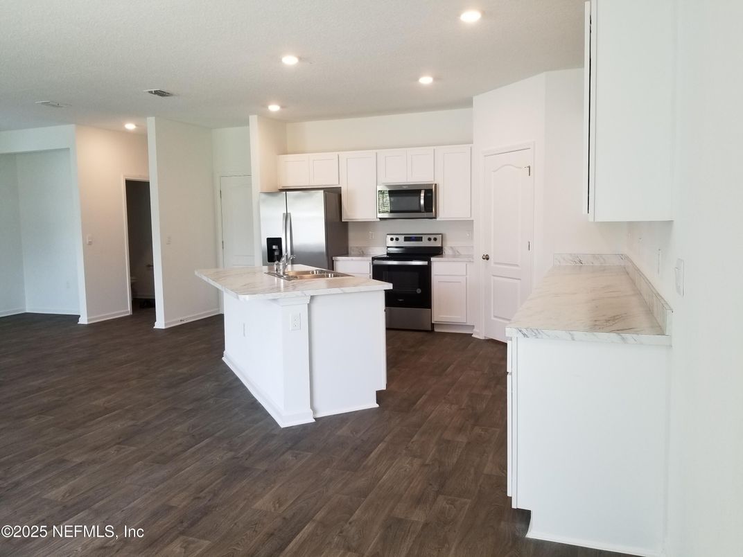 Interior, Kitchen, Recessed Lighting, Stainless Steel Appliances, Wood Texture Flooring