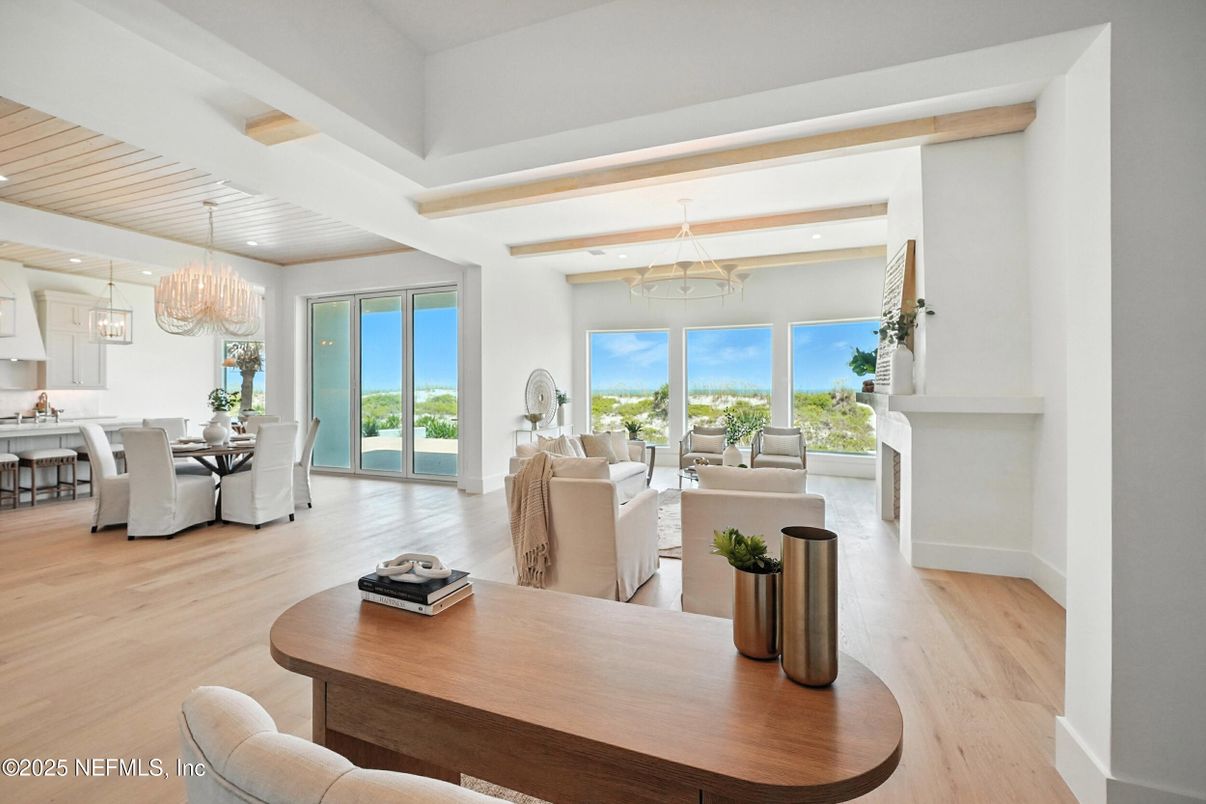 Chandelier, Dining room, Fireplace, Interior, Living room, Pendant Lights, Recessed Lighting, Water, Wood Texture Flooring