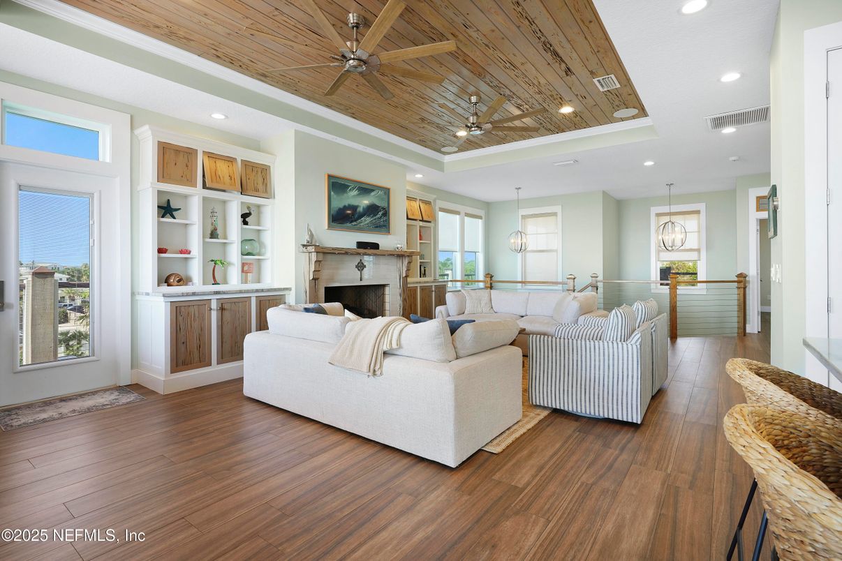 Dining room, Fireplace, Interior, Living room, Pendant Lights, Recessed Lighting, Wooden Ceilings, Wood Texture Flooring