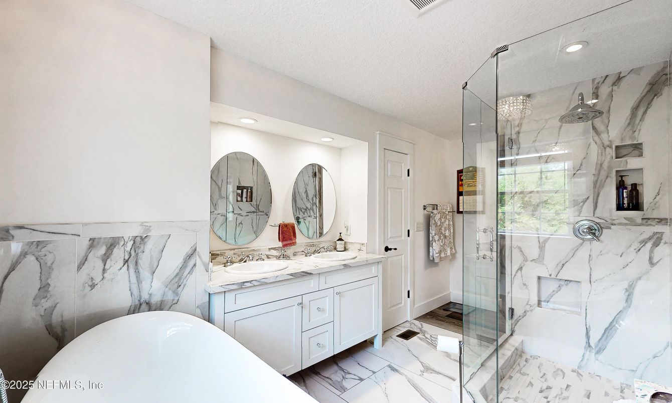 Bathroom, Dual Sink Vanities, Glass Shower, Interior, Marble, Marble Walls, Recessed Lighting