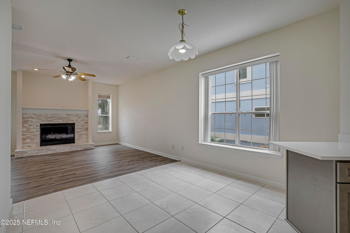 Empty room, Fireplace, Interior, Pendant Lights, Recessed Lighting, Wood Texture Flooring