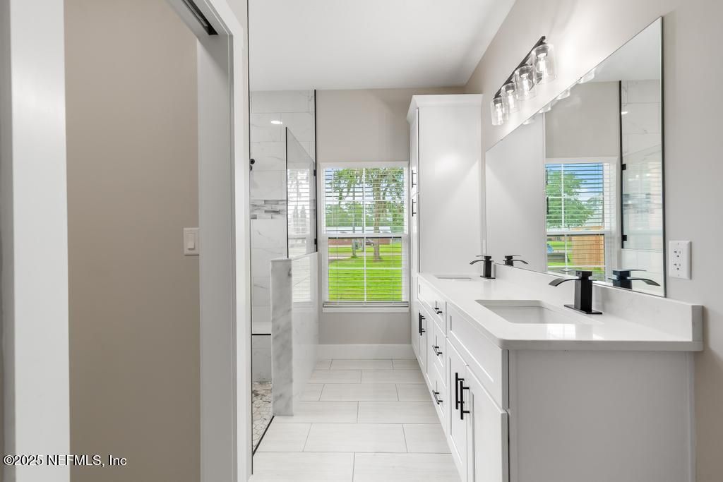 Bathroom, Dual Sink Vanities, Glass Shower, Interior, Marble Walls