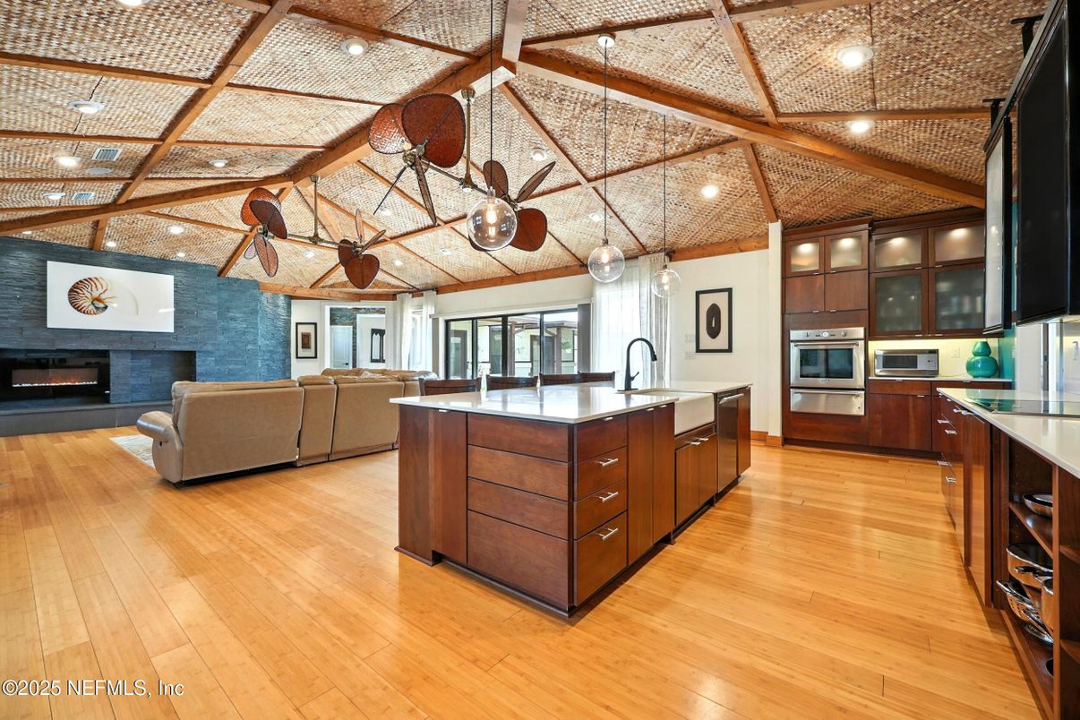 Fireplace, Interior, Kitchen, Living room, Recessed Lighting, Stainless Steel Appliances, Wooden Beams, Wooden Ceilings, Wood Texture Flooring