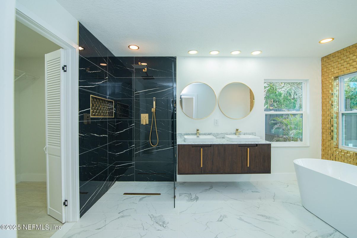 Bathroom, Dual Sink Vanities, Free Standing Baths, Interior, Marble, Marble Walls, Recessed Lighting