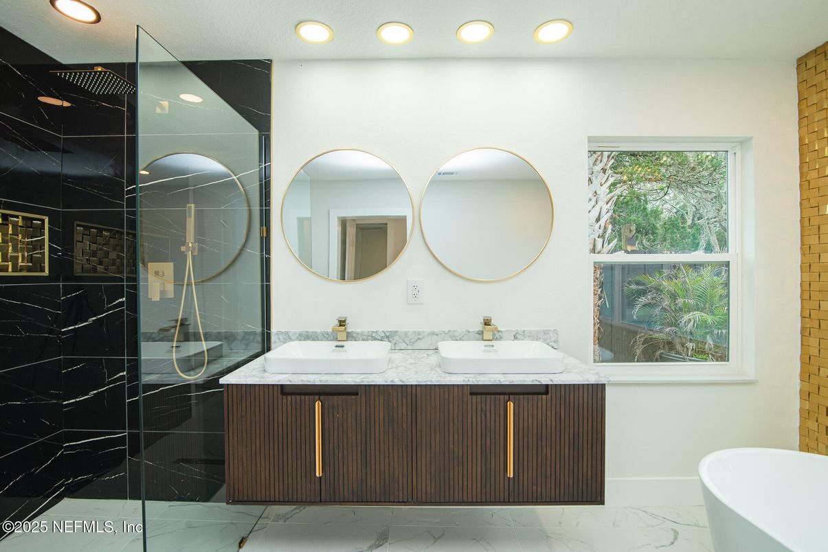 Bathroom, Dual Sink Vanities, Free Standing Baths, Glass Shower, Interior, Marble, Marble Walls, Recessed Lighting