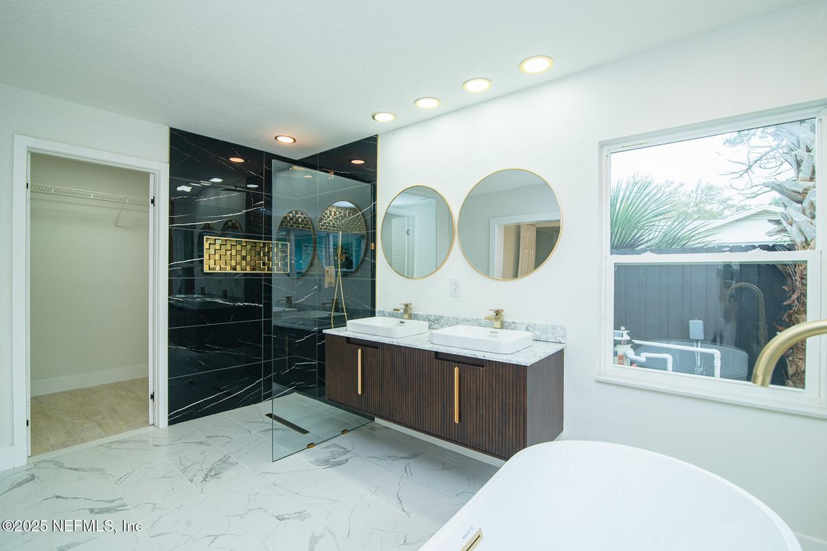 Bathroom, Dual Sink Vanities, Free Standing Baths, Interior, Marble, Marble Walls, Recessed Lighting