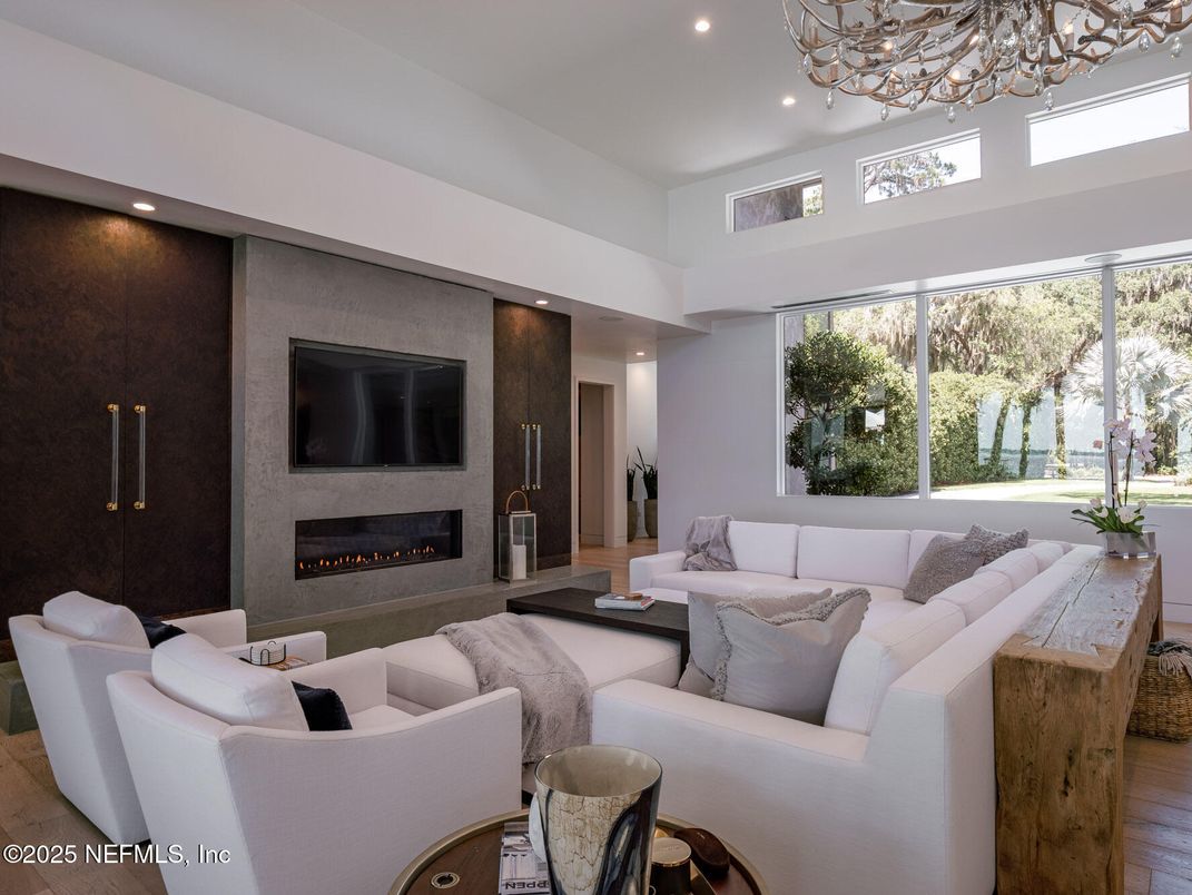 Chandelier, Fireplace, Interior, Living room, Recessed Lighting, Wood Texture Flooring