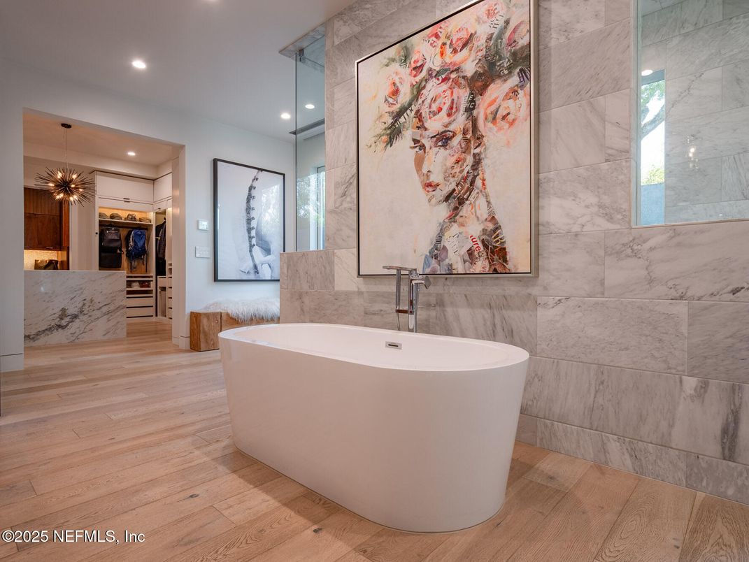 Bathroom, Free Standing Baths, Interior, Marble Walls, Pendant Lights, Recessed Lighting, Wood Texture Flooring