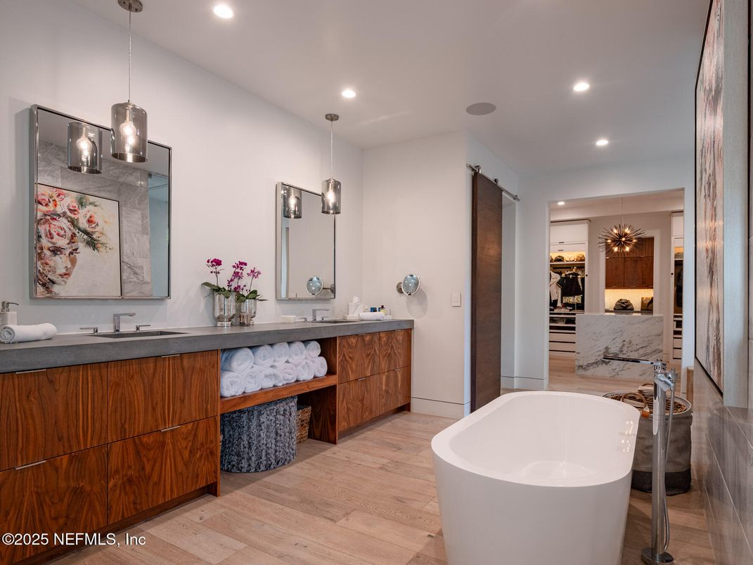 Bathroom, Dual Sink Vanities, Free Standing Baths, Interior, Pendant Lights, Recessed Lighting, Wood Texture Flooring