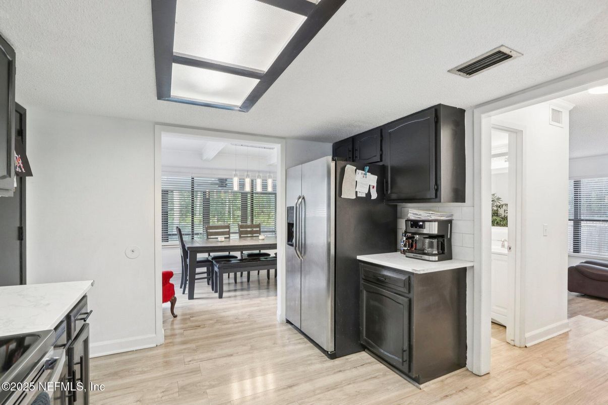 Dining room, Interior, Kitchen, Pendant Lights, Stainless Steel Appliances, Wood Texture Flooring