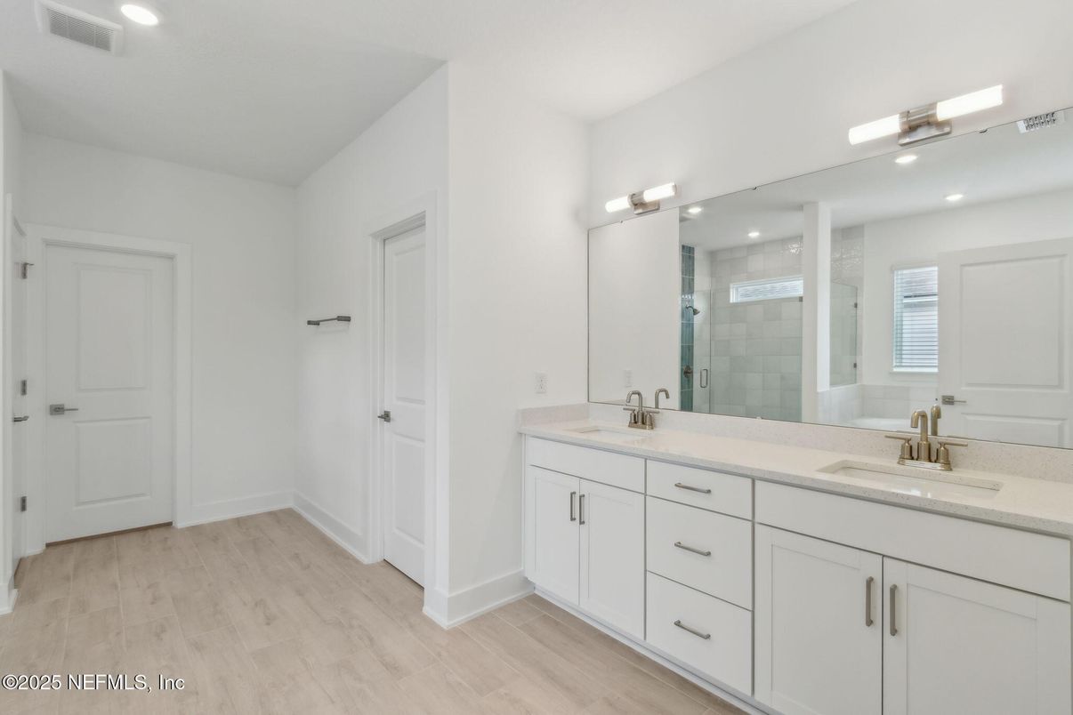 Bathroom, Dual Sink Vanities, Glass Shower, Interior, Recessed Lighting, Wood Texture Flooring