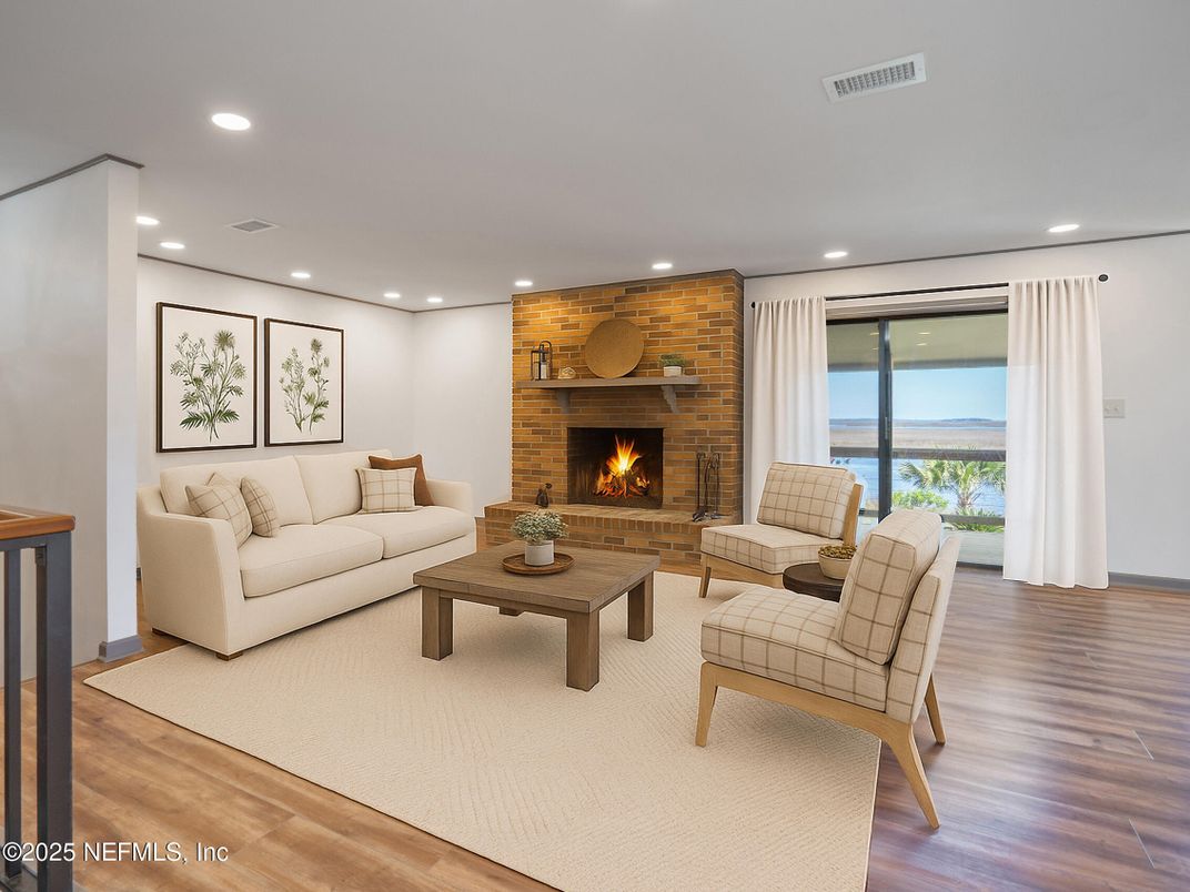 Fireplace, Interior, Living room, Recessed Lighting, Stone Walls, Water, Wood Texture Flooring
