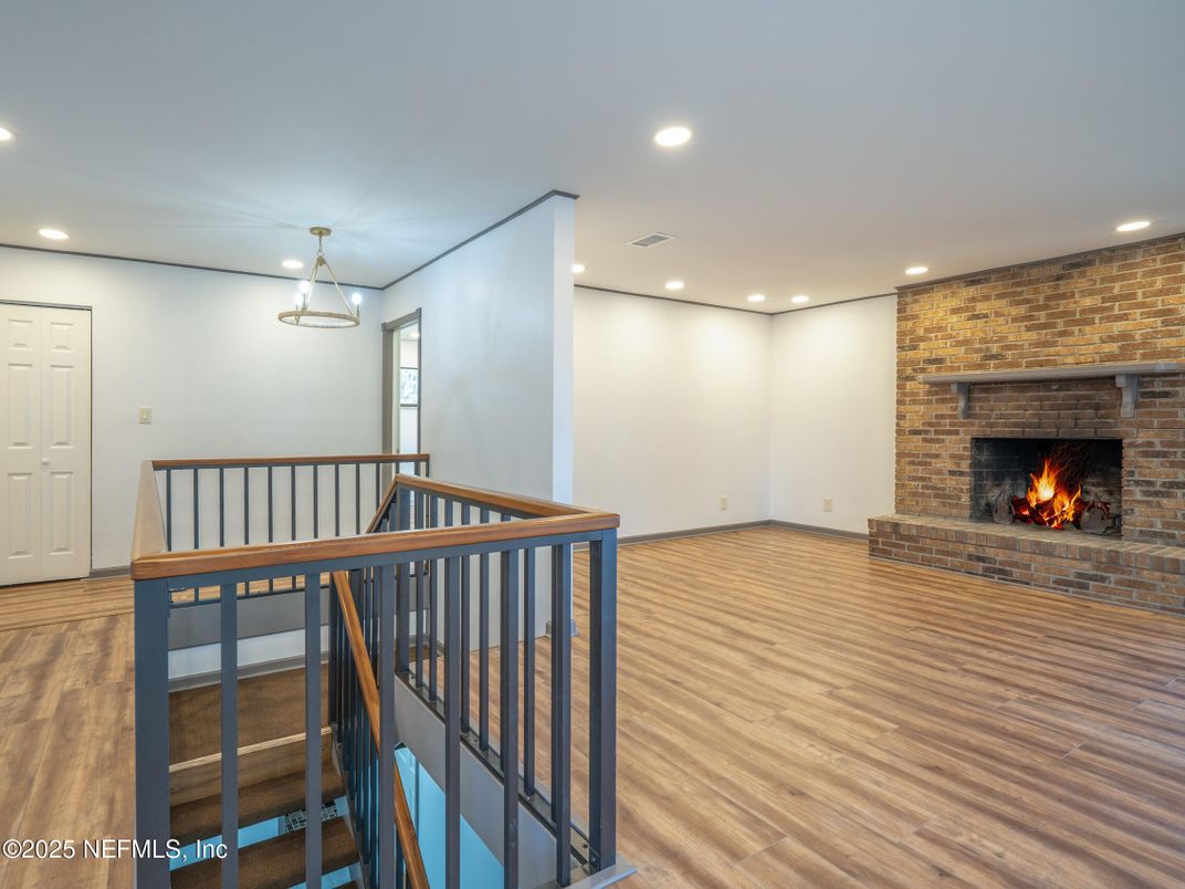 Fireplace, Interior, Recessed Lighting, Stone Walls, Wood Texture Flooring