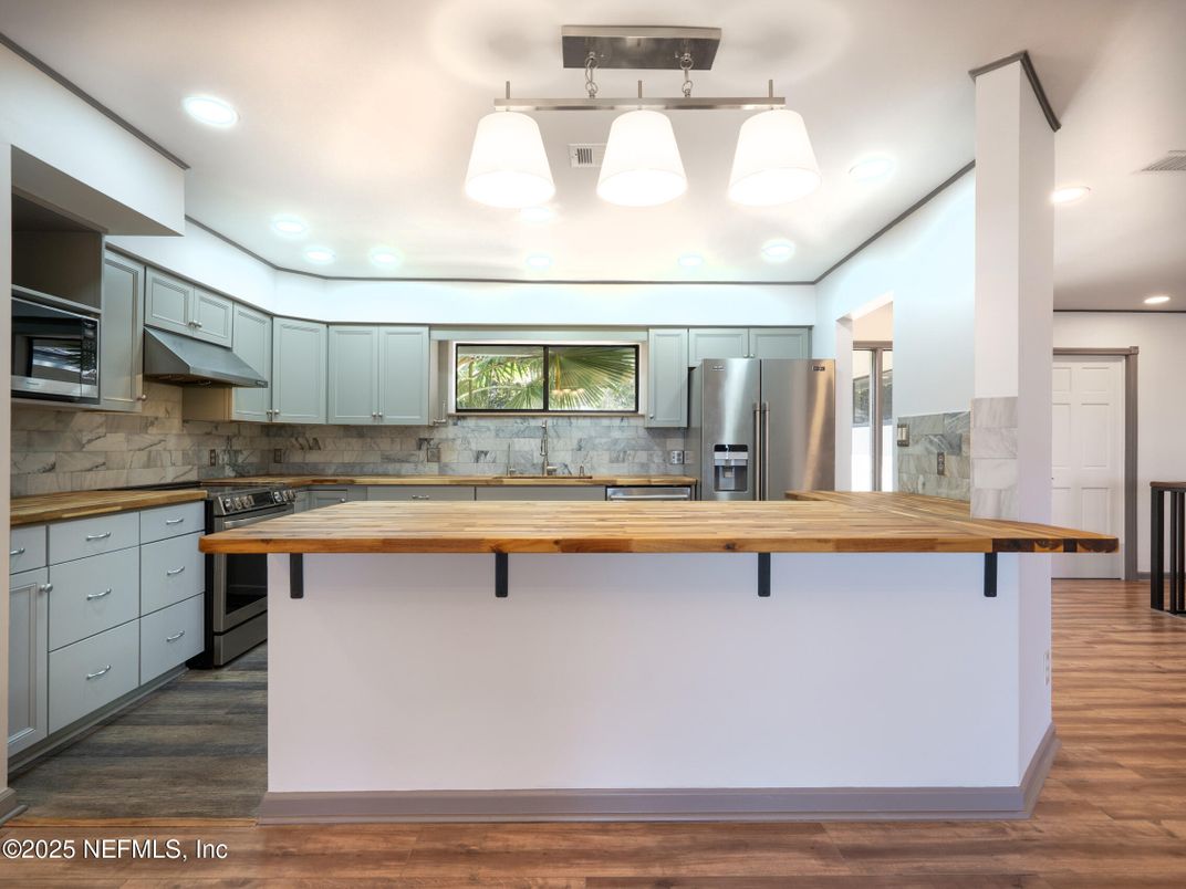Interior, Kitchen, Recessed Lighting, Stainless Steel Appliances, Wood Texture Flooring