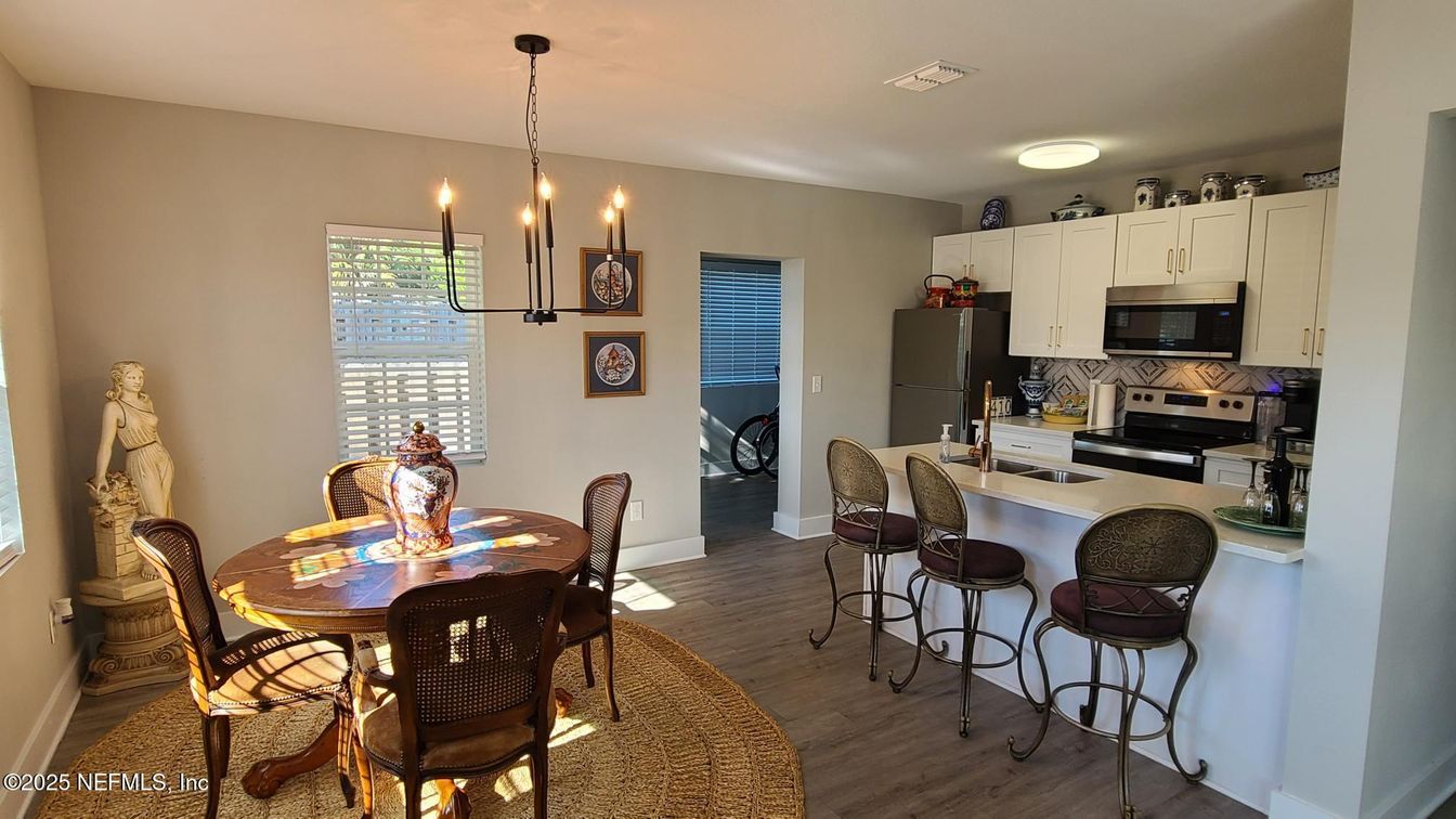 Dining room, Interior, Kitchen, Pendant Lights, Stainless Steel Appliances, Wood Texture Flooring