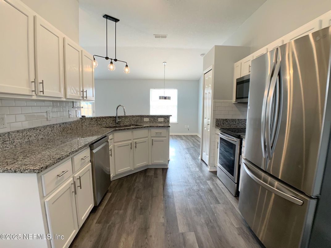 Fireplace, Interior, Kitchen, Pendant Lights, Stainless Steel Appliances, Wood Texture Flooring